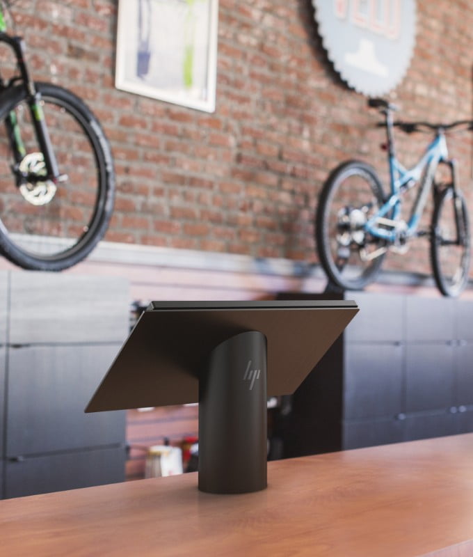 An HP Engage One system at the checkout counter in a bikes store